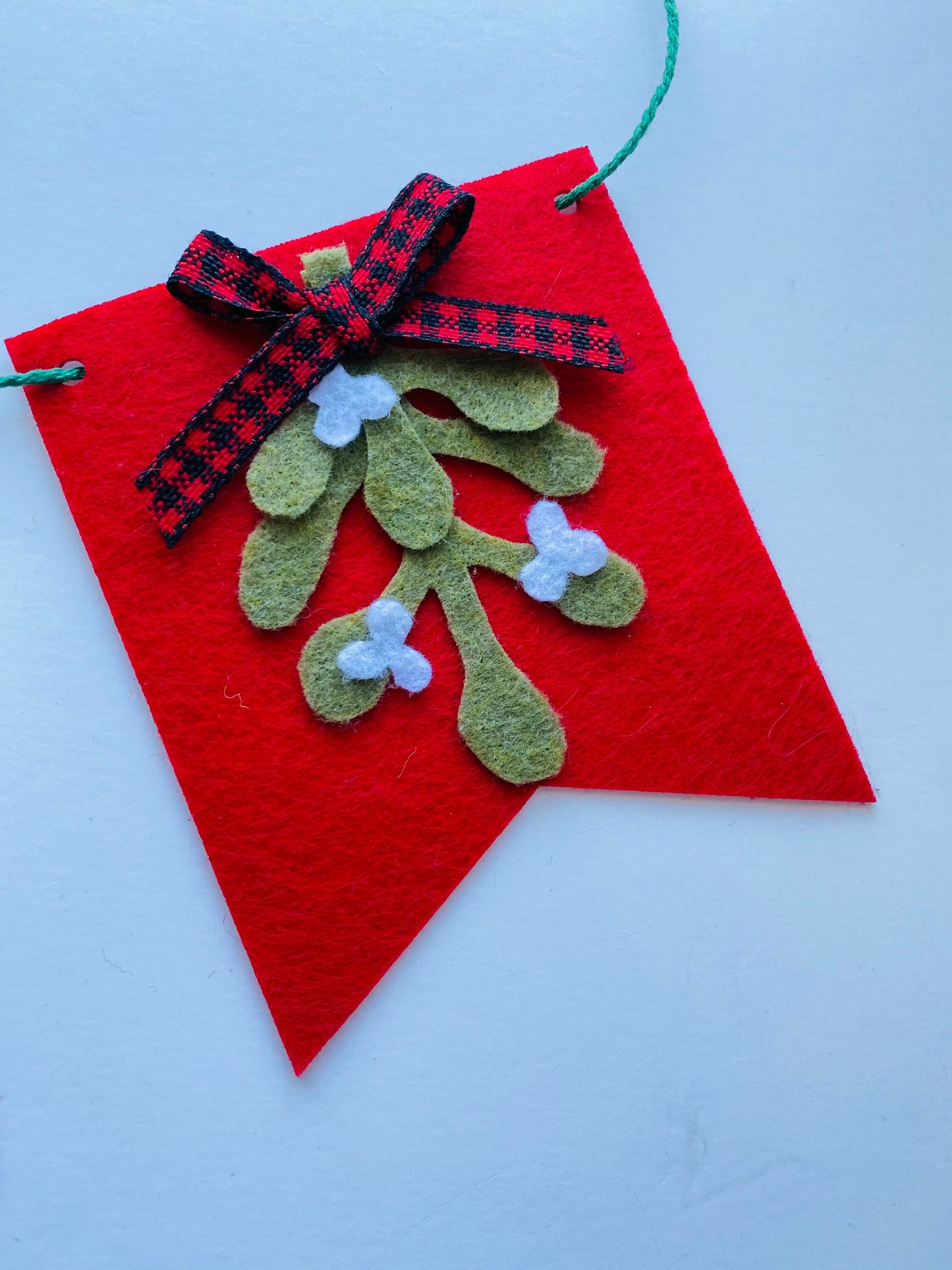 Christmas Flag Bunting with Pennants featuring Mistletoe, Candy Canes, Sleigh, Candle with Lantern, and Pinecone