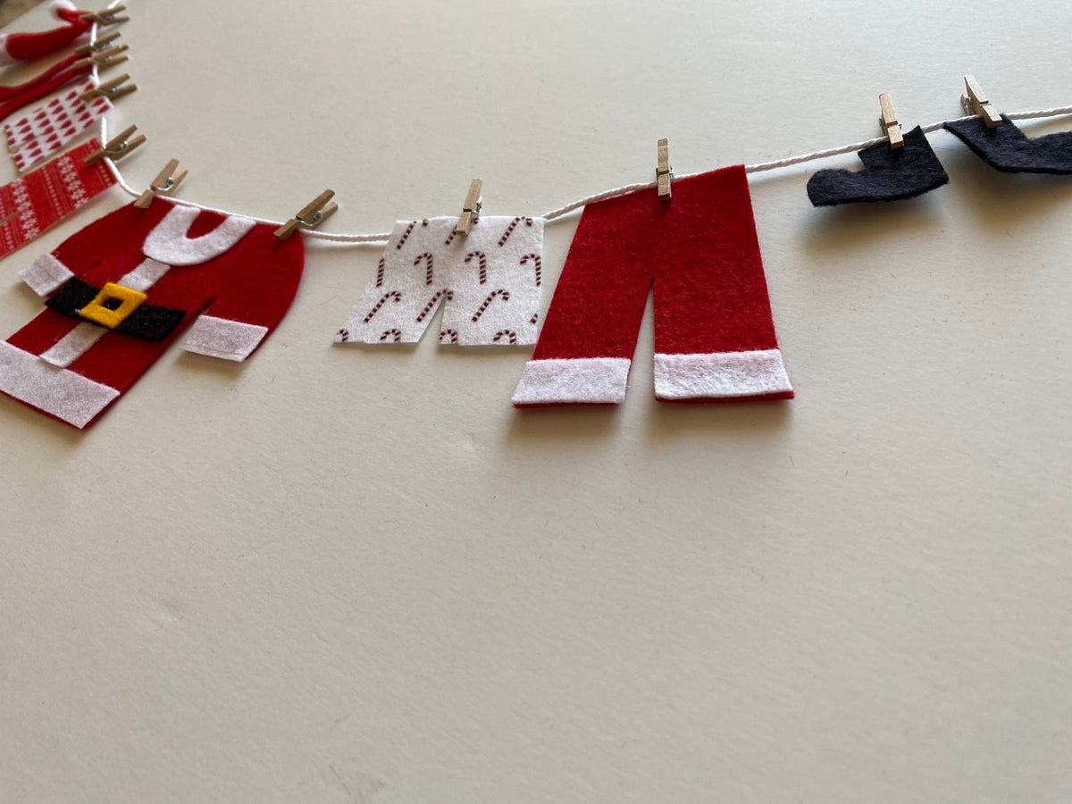 Santa's Laundry Clothesline Christmas decoration featuring Santa's underwear
