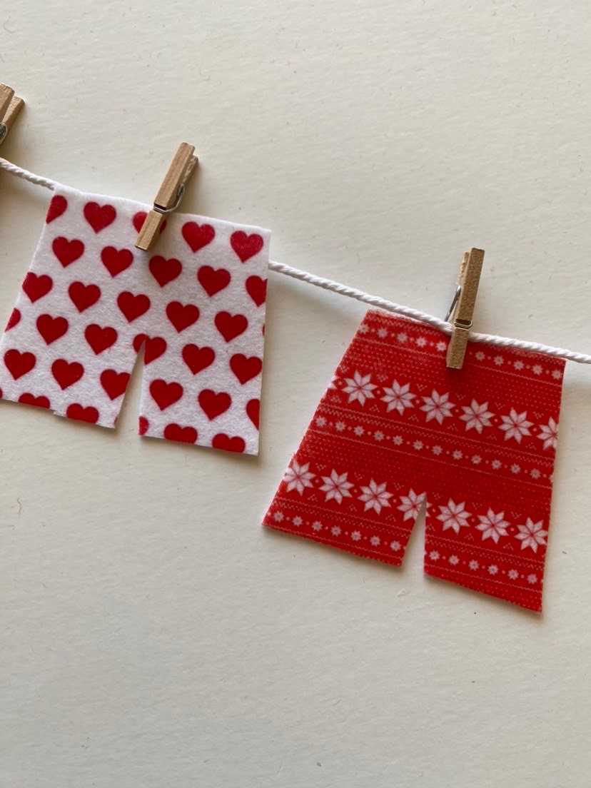 Santa's Laundry Clothesline Christmas decoration featuring Santa's underwear