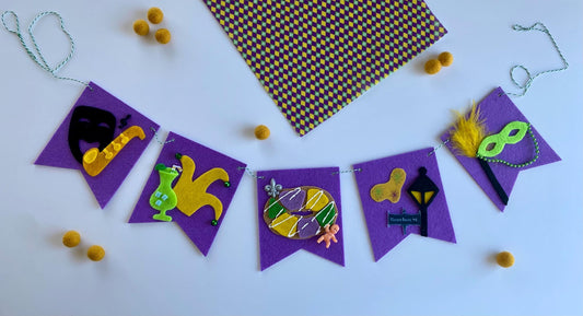 Mardi Gras Flag Bunting with Pennants featuring Bourbon St, King Cake, Masks, Fleur de Lis, Drinks, Beads, and Saxophone